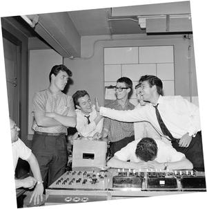 From left: Bruce Welch, Brian Bennett, Hank Marvin, Brian "Licorice" Locking and Cliff Richard lark about behind despairing engineer Malcolm Addey.