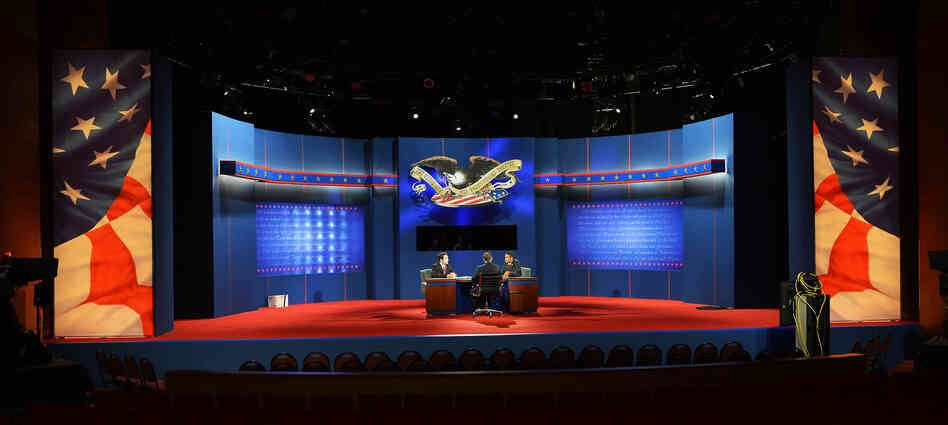 Stand-ins for President Obama, Republican presidential candidate Mitt Romney and moderator Bob Scheiffer rehearse a day ahead of the final presidential debate at Lynn University in Boca Raton, Fla, on Sunday. Stand-ins for President Obama, Republican presidential candidate Mitt Romney and moderator Bob Scheiffer rehearse a day ahead of the final presidential debate at Lynn University in Boca Raton, Fla, on Sunday.
