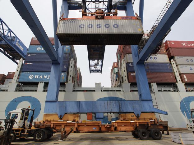 A container ship from China is offloaded at Massport's Conley Terminal in the port of Boston in July. Trade issues with China has been a major talking point for the presidential candidates.