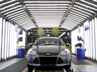 A Ford Focus on the assembly line in Wayne, Mich. "We have a lot going for us; we've got our problems, but others have problems that are as bad or worse," says Nariman Behravesh, chief economist at IHS Global Insight. A Ford Focus on the assembly line in Wayne, Mich. "We have a lot going for us; we've got our problems, but others have problems that are as bad or worse," says Nariman Behravesh, chief economist at IHS Global Insight.