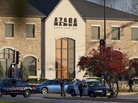 Police personnel work outside the Azana Salon and Spa where three people were killed and four others wounded after a mass shooting on Sunday in Brookfield, Wisconsin. Police personnel work outside the Azana Salon and Spa where three people were killed and four others wounded after a mass shooting on Sunday in Brookfield, Wisconsin.