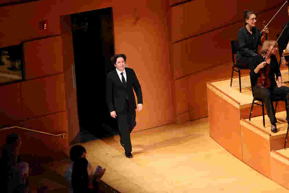 Dudamel comes back onstage to receive the audience's cheers at the end of The Rite of Spring.