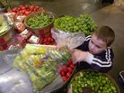 Parents now have more advice to consider when it comes to choosing organic foods. Here, Theo Shriver, 6, weighs organic produce at the Puget Consumers Co-op in Seattle. Parents now have more advice to consider when it comes to choosing organic foods. Here, Theo Shriver, 6, weighs organic produce at the Puget Consumers Co-op in Seattle.