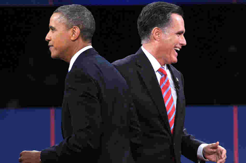President Obama and GOP presidential nominee Mitt Romney walk away after they greet each other at the end of the third presidential debate in Boca Raton, Fla., on Monday. President Obama and GOP presidential nominee Mitt Romney walk away after they greet each other at the end of the third presidential debate in Boca Raton, Fla., on Monday.