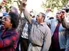 The Lambreaux men protest the demolition of housing projects.
