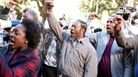The Lambreaux men protest the demolition of housing projects. The Lambreaux men protest the demolition of housing projects.