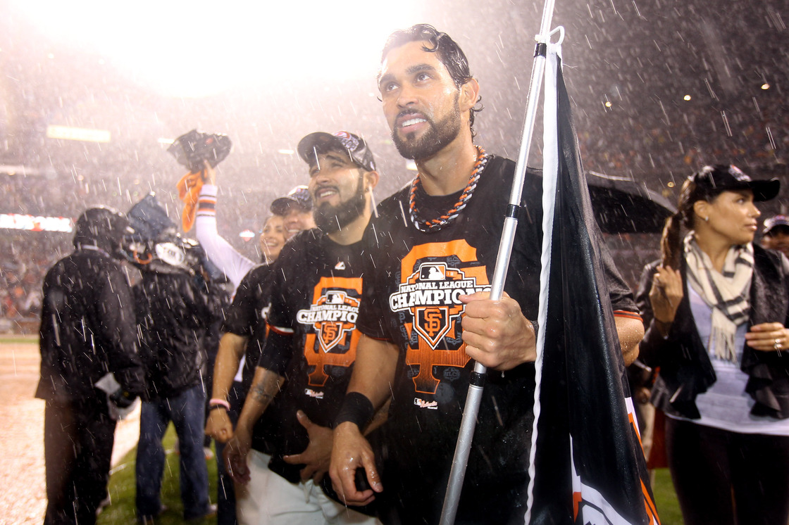 Angel Pagan (No. 16) of the San Francisco Giants celebrates after the Giants' 9-0 victory against the St. Louis Cardinals in Game 7 of the National League Championship Series in San Francisco.