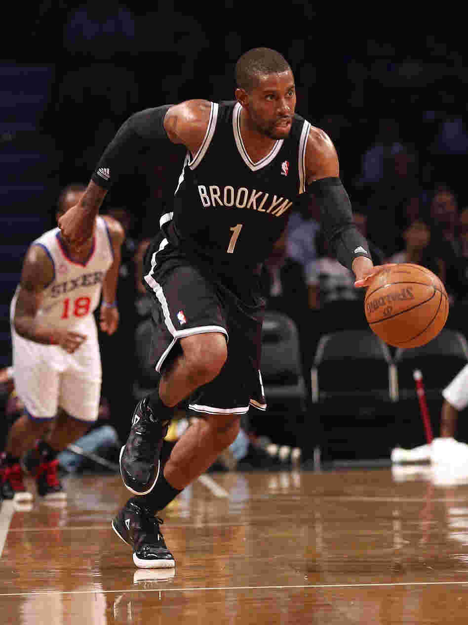 C.J. Watson of the Brooklyn Nets dribbles upcourt in a preseason game against the Philadelphia 76ers. The New York City borough finally has a pro sports team to call its own, says Frank Deford.