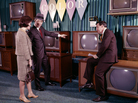 A couple talks to a salesman about buying a color TV set. Over the years, televisions have evolved to include color, high-definition and 3-D models. A couple talks to a salesman about buying a color TV set. Over the years, televisions have evolved to include color, high-definition and 3-D models.