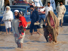 Aug. 28: A flooded road in Peshawar, Pakistan. Aug. 28: A flooded road in Peshawar, Pakistan.