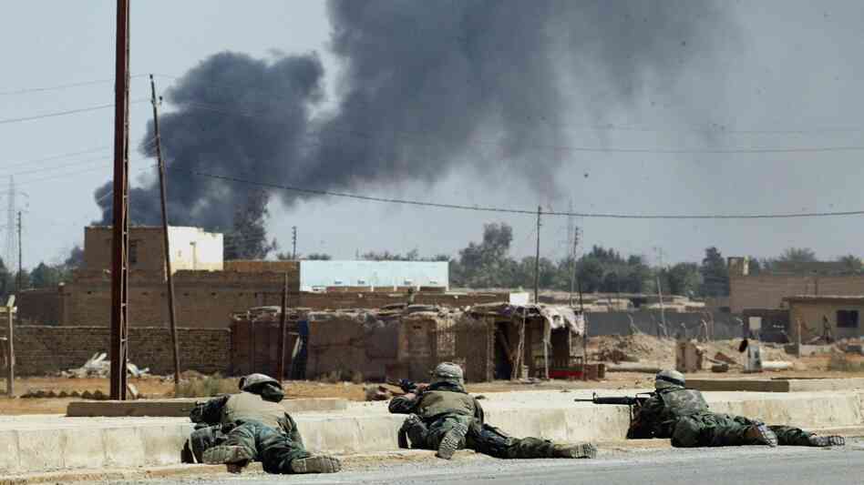 A scene from the early days of the fighting in Iraq in the spring of 2003. In one incident, three members of an Iraqi family were killed. A U.S. Marine involved in the shooting recently tracked down the family to ask for forgiveness. A scene from the early days of the fighting in Iraq in the spring of 2003. In one incident, three members of an Iraqi family were killed. A U.S. Marine involved in the shooting recently tracked down the family to ask for forgiveness.