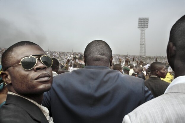 The photos in his series Congo Democratic "trace some aspects of the individuals and institutions that have been in power in the Congo," writes photographer Guy Tillim. Here, presidential candidate Jean-Pierre Bemba enters a stadium in central Kinshasa flanked by his bodyguards during an election rally.