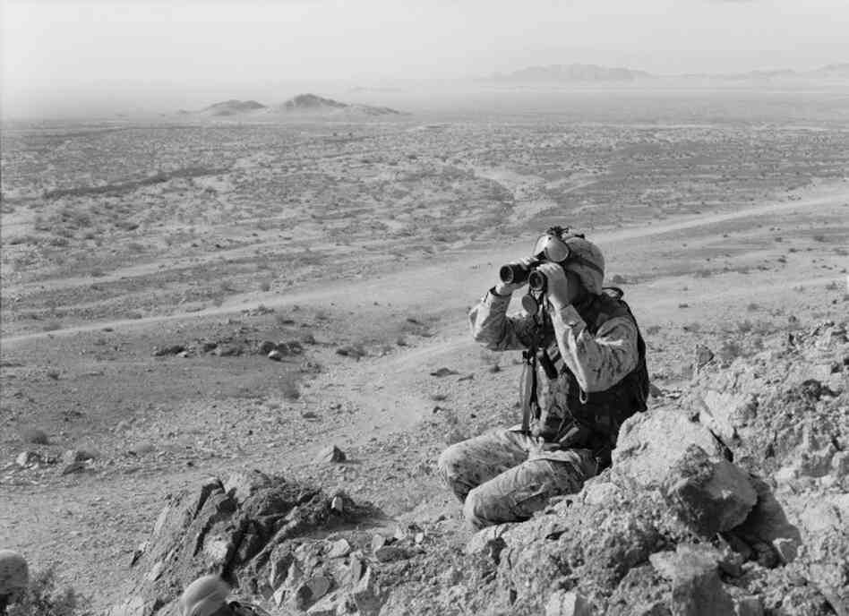"Tucked in the high desert, the training center's landscape is not dissimilar from parts of Afghanistan and Iraq. I embarked on the process of documenting the intricate live fire maneuvers the troops underwent prior to their deployment to Iraq," writes An-My Le. Twentynine Palms, Calif. "Tucked in the high desert, the training center's landscape is not dissimilar from parts of Afghanistan and Iraq. I embarked on the process of documenting the intricate live fire maneuvers the troops underwent prior to their deployment to Iraq," writes An-My Le. Twentynine Palms, Calif.