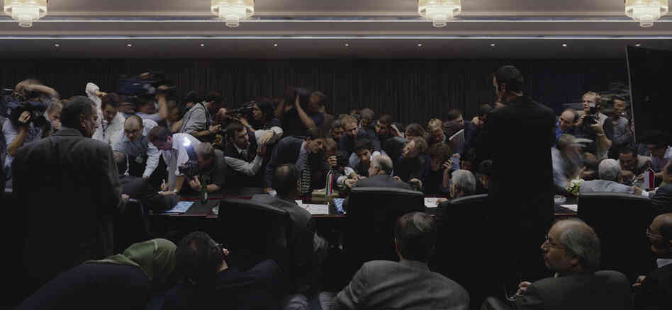 "I sometimes work where power presents itself as a spectacle, as an event produced for or with the media, and my pictures may then take an ironic undertone," writes Luc Delahaye. "But I photograph the ordinary man more often than the leader." 132nd Ordinary Meeting of the Conference, OPEC headquarters, Vienna, Austria, 2004 "I sometimes work where power presents itself as a spectacle, as an event produced for or with the media, and my pictures may then take an ironic undertone," writes Luc Delahaye. "But I photograph the ordinary man more often than the leader." 132nd Ordinary Meeting of the Conference, OPEC headquarters, Vienna, Austria, 2004