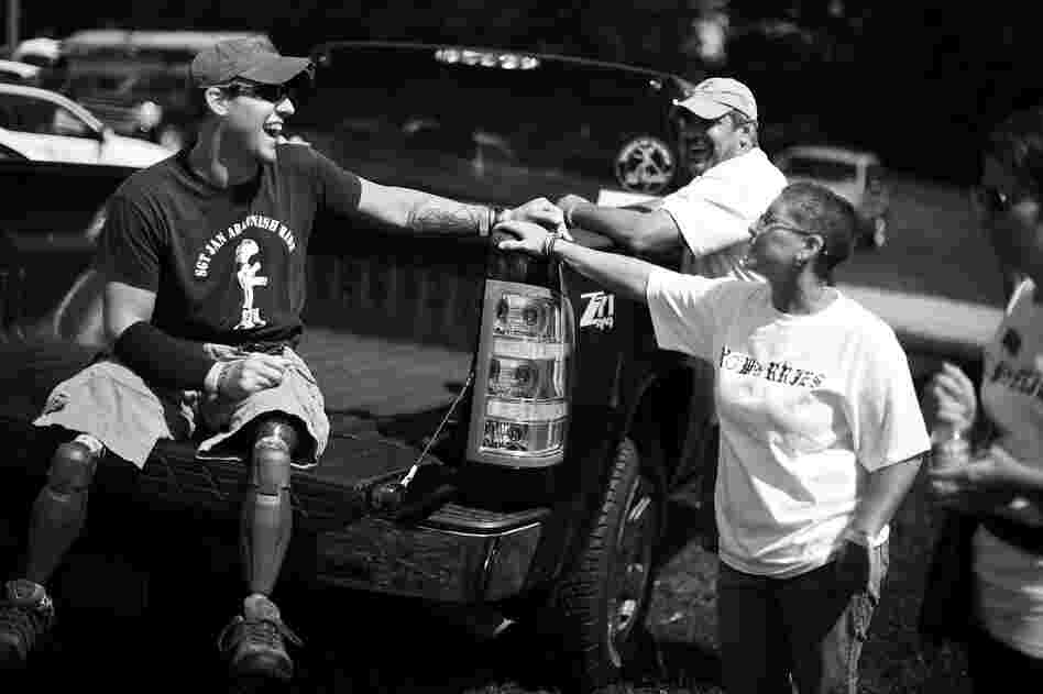 Nick Staback, who lost both of his legs to a bomb in Afghanistan, talks with his mother, Maria Staback, in Scranton, Pa. Maria Staback took a leave of absence from her job to move in with her son while he was recuperating at Walter Reed National Military Medical Center outside Washington, D.C.