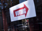 A sign directing voters to a polling place is seen during the first day of early voting on Monday in Washington, D.C. A sign directing voters to a polling place is seen during the first day of early voting on Monday in Washington, D.C.
