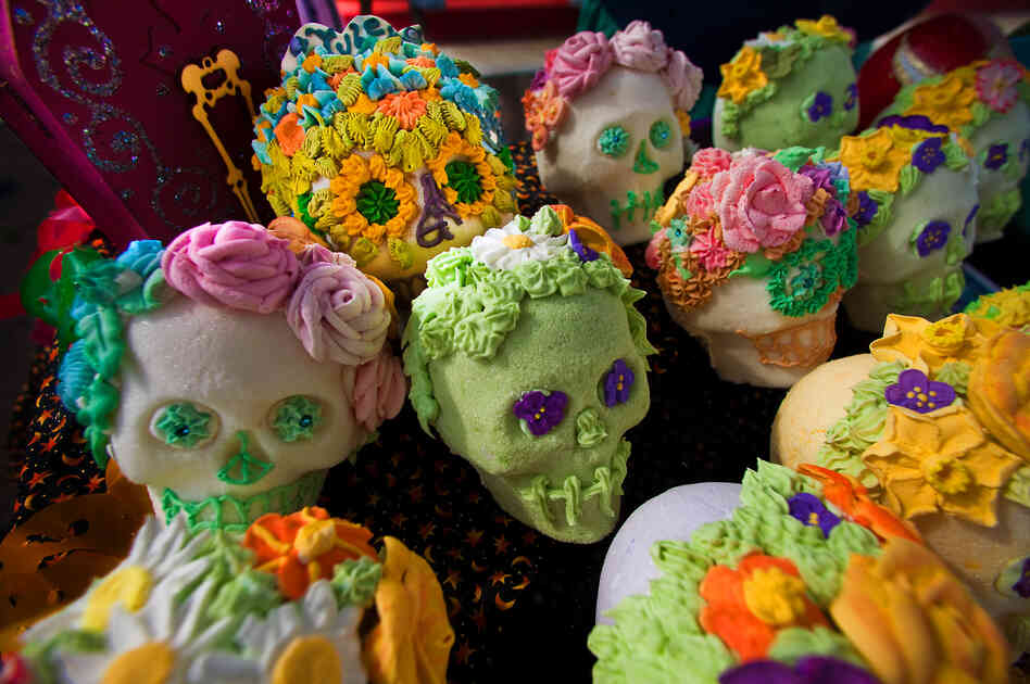 Sugar skulls: Elaborately decorated skulls are crafted from pure sugar and given to friends as gifts. The colorful designs represent the vitality of life and individual personality. Sugar skulls: Elaborately decorated skulls are crafted from pure sugar and given to friends as gifts. The colorful designs represent the vitality of life and individual personality.