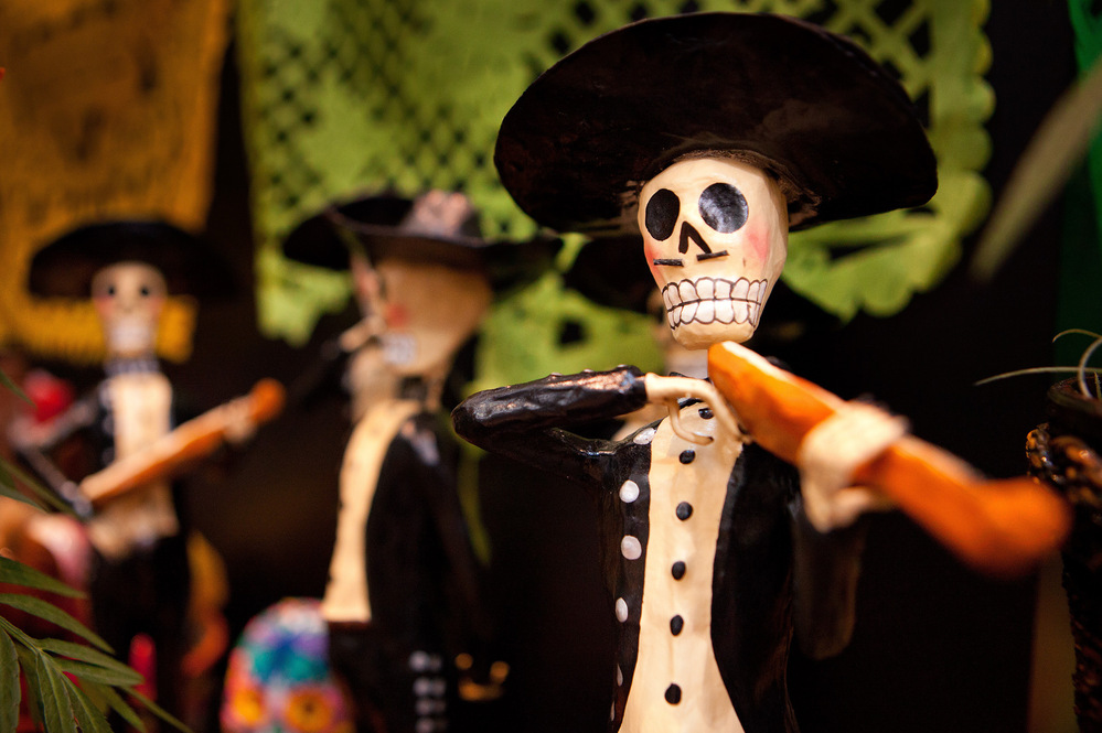 Skeletons: Skeleton imagery pervades this holiday. In pre-Columbian times, the Day of the Dead was celebrated in August. It now takes place on Nov. 1 and Nov. 2, coinciding with the Catholic holidays of All Saints' Day and All Souls' Day.