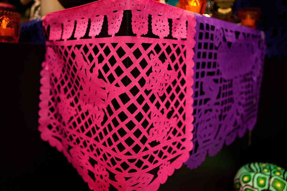 Papel picado: Delicately decorated tissue paper is used to represent wind and the fragility of life. Papel picado: Delicately decorated tissue paper is used to represent wind and the fragility of life.