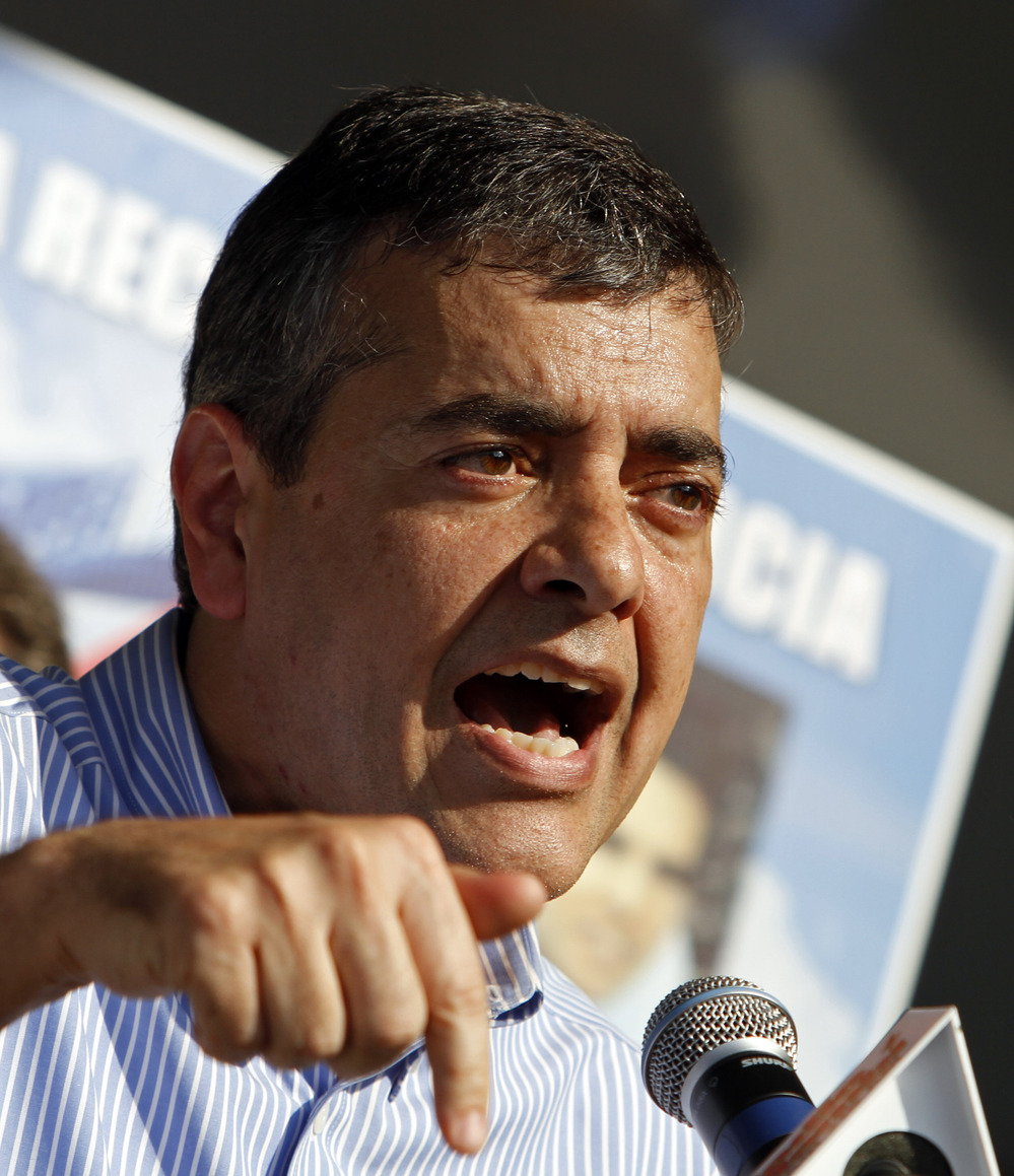 Rep. David Rivera, R-Fla., talks during a freedom for Cuba march in Miami on Feb. 24, 2011.