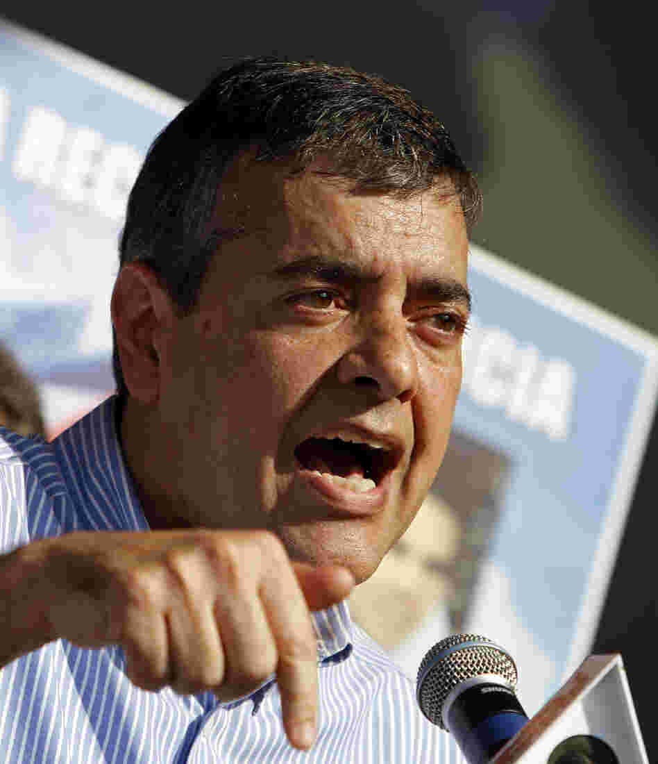Rep. David Rivera, R-Fla., talks during a freedom for Cuba march in Miami on Feb. 24, 2011.