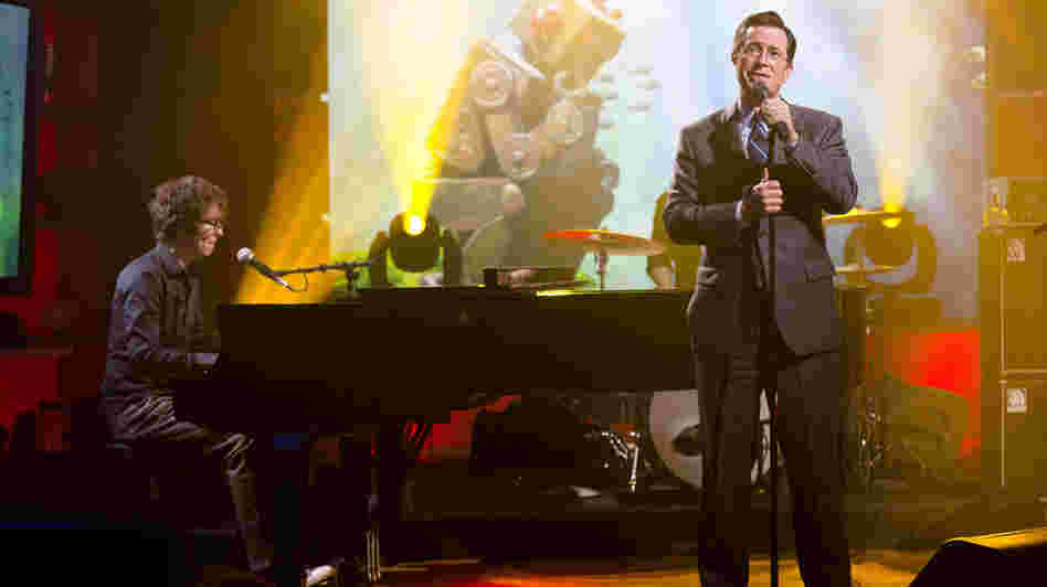 Stephen Colbert (right) performs with Ben Folds on the set of his TV show, The Colbert Report.