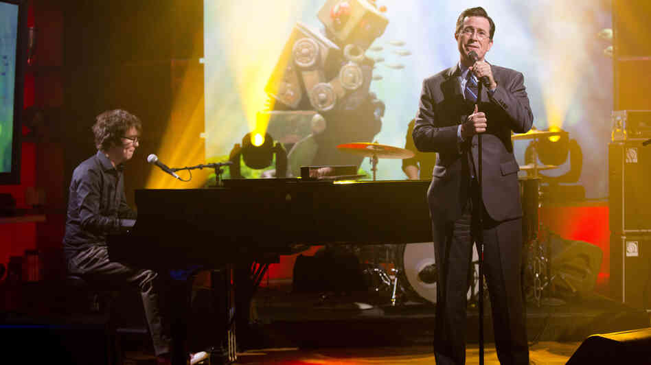 Stephen Colbert (right) performs with Ben Folds on the set of his TV show, The Colbert Report.