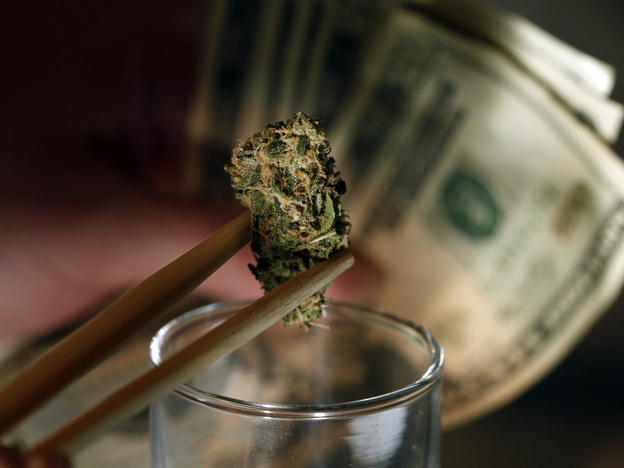 A marijuana bud at a marijuana dispensary in Denver. Colorado, Oregon and Washington could become the first to legalize marijuana this fall.