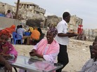 Somalis chat at a beach-side restaurant earlier this month. After two decades of civil war, Somali's capital, Mogadishu, is beginning to recover. Somalis chat at a beach-side restaurant earlier this month. After two decades of civil war, Somali's capital, Mogadishu, is beginning to recover.