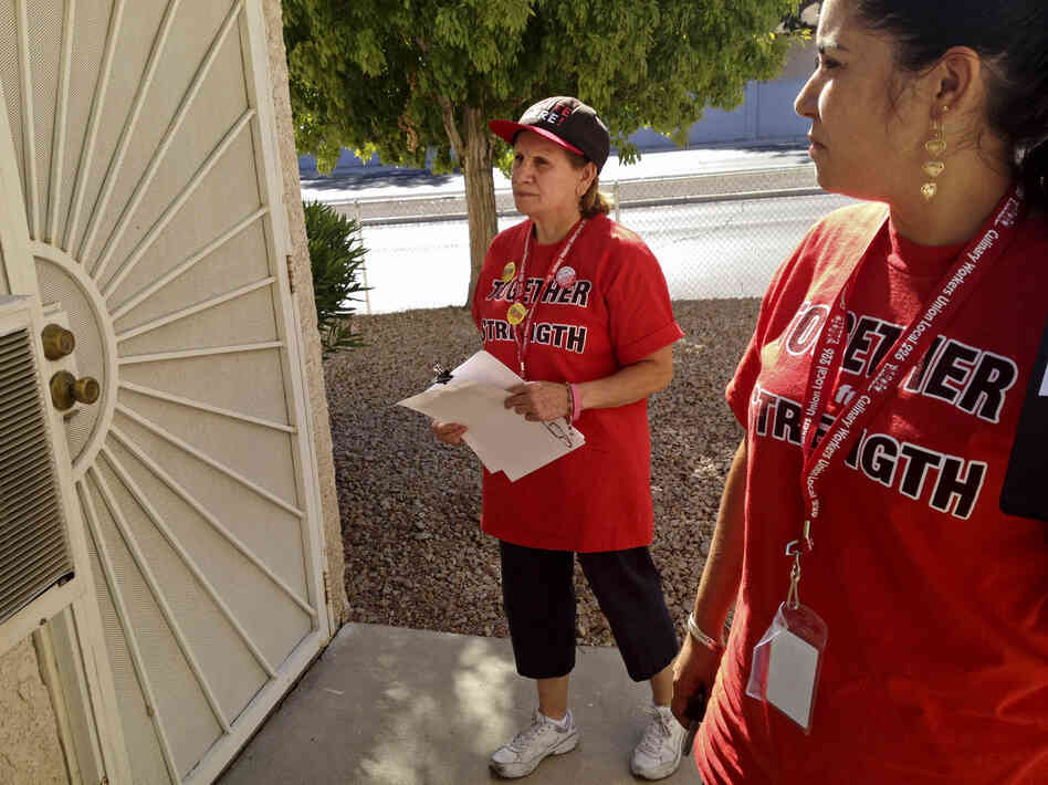 Culinary Union members Emilia Cabrera (left) and Dallany Santos canvass in Las Vegas for the union's get-out-the-vote effort for President Obama.