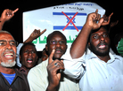 Sudanese demonstrators hold banners and chant anti-Israeli slogans during a protest in Khartoum on Wednesday, following a missile strike that hit a factory. Sudan blames Israel for the attack. Israel has not commented on the charge. Sudanese demonstrators hold banners and chant anti-Israeli slogans during a protest in Khartoum on Wednesday, following a missile strike that hit a factory. Sudan blames Israel for the attack. Israel has not commented on the charge.