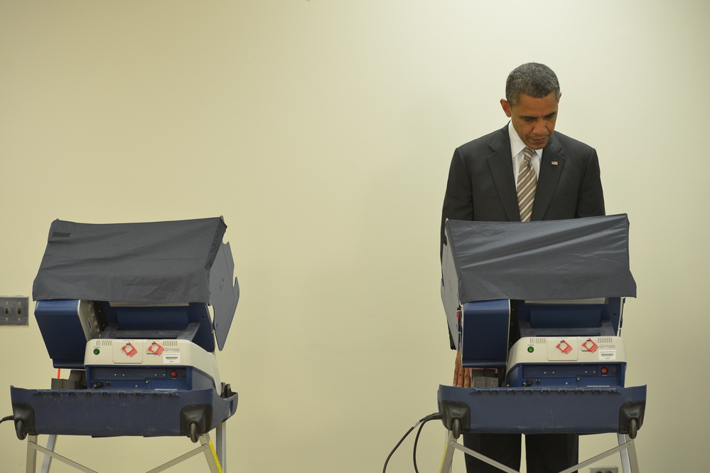 President Obama casts his early ballot on at the Martin Luther King Community Center in Chicago.