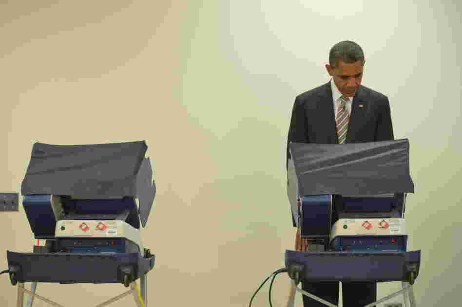 President Obama casts his early ballot on at the Martin Luther King Community Center in Chicago.