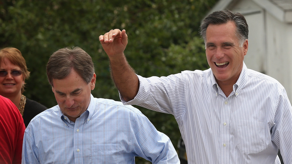 Republican presidential candidate Mitt Romney greets supporters at an Indiana campaign event with U.S. Senate candidate Richard Mourdock in August. Mourdock has come under fire for controversial comments about rape.