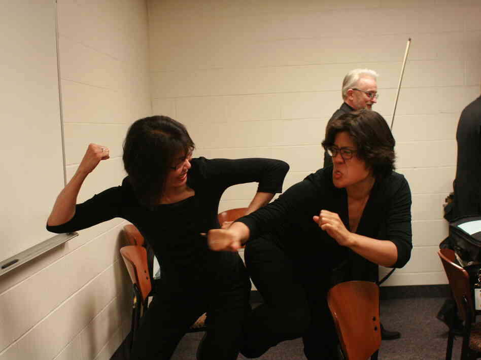 St. Paul Chamber Orchestra violists Evelina Chao and Maiya Papach wage battle in happier times.
