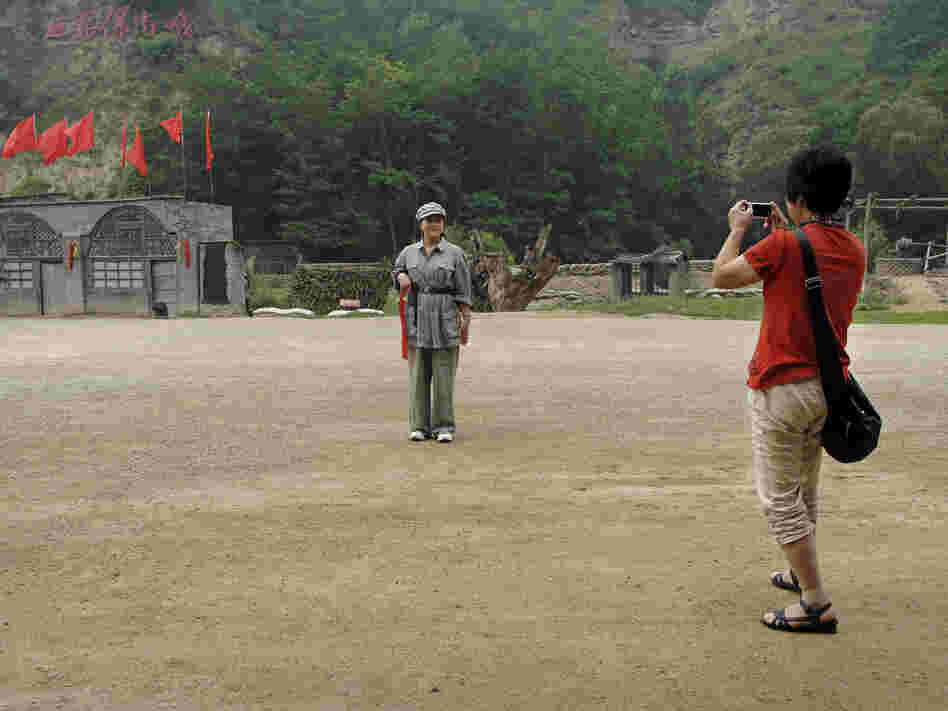 A tourist models communist chic.
