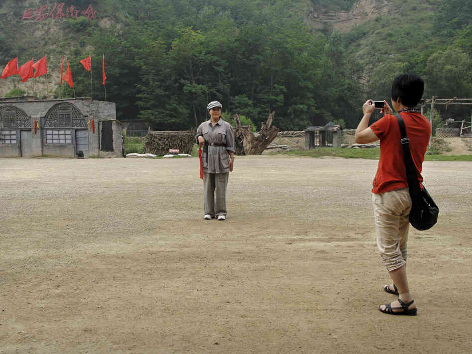 A tourist models communist chic.