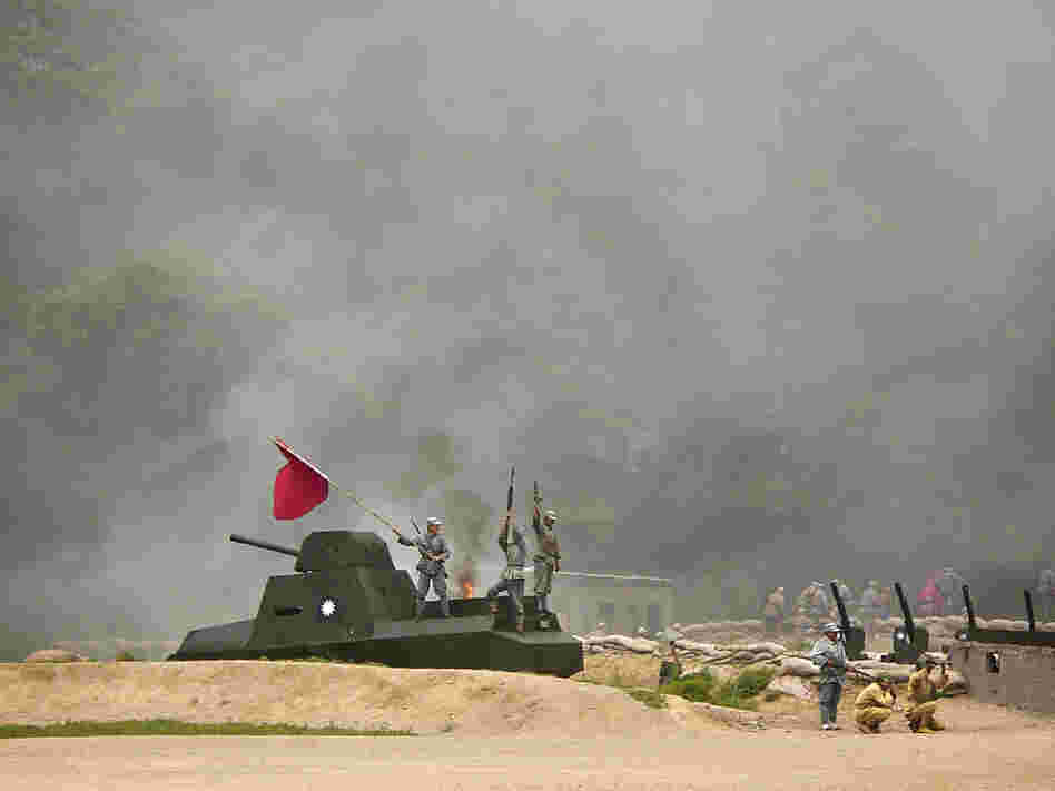 "The Defense of Yan'an" is a whizbang performance that includes lots of fighting, an antique tank and a plane zooming down a zip wire.