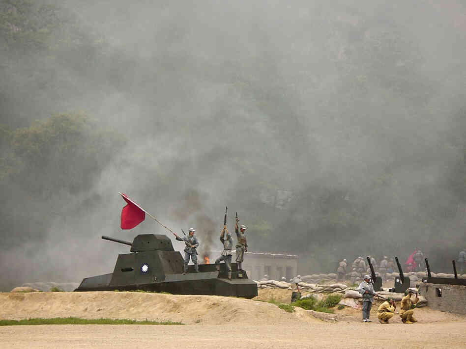 "The Defense of Yan'an" is a whizbang performance that includes lots of fighting, an antique tank and a plane zooming down a zip wire.