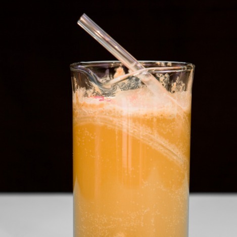 Suicide Stomach Contents: Bartender James Dance of Loading in Cornwall concocted this mixture of flavored vodka, chocolate pieces, skittles, and absinthe, with empty pill casings for garnish, modeled on pathology lab stomach specimen.