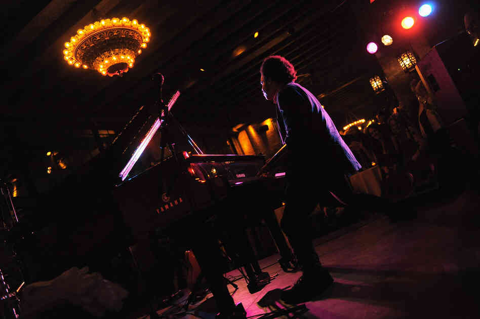 Eric Lewis, as ELEW, performs at the Blue Man Group's 20th anniversary after party in 2011.