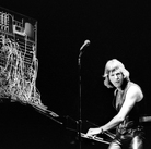 I think we can all agree that he deserves at least a little bit of the blame: Keith Emerson of Emerson, Lake & Palmer on stage with his Moog synthesizer.
