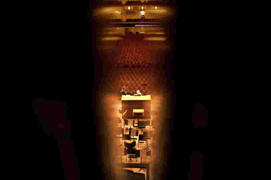 The organ console and concert hall as seen through the pipes of the organ chamber set behind the orchestra. The new organ boasts 1,000 more pipes than the previous one — nearly 5,000 pipes in total.