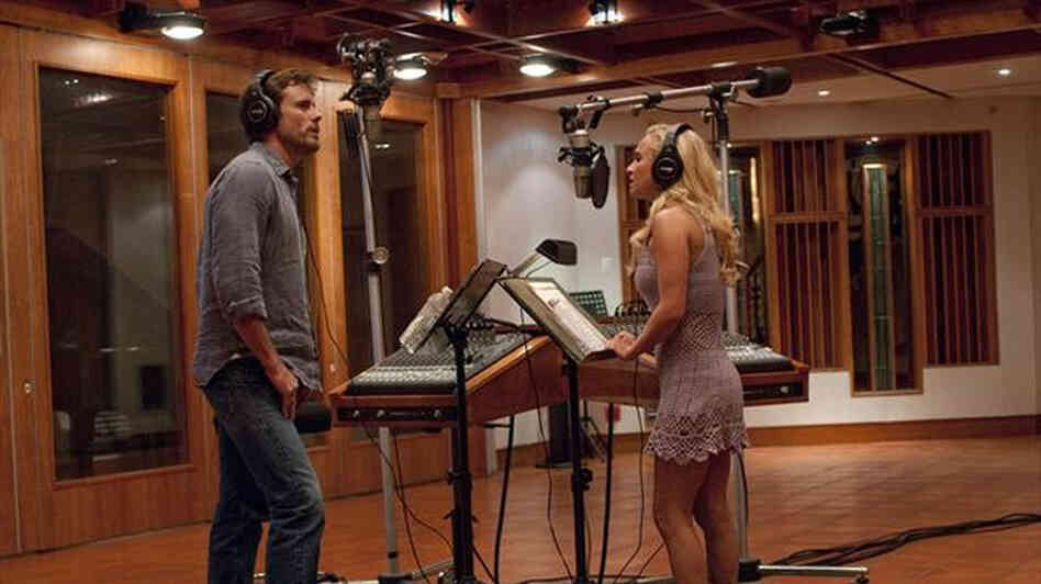 Nashville veteran Deacon (Charles Esten) and upstart country-pop star Juliette (Hayden Panettiere) record a duet in a scene from ABC's Nashville.