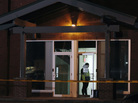 A Framingham police officer keeps watch as federal agents search the New England Compounding Center company in Framingham, Mass., on October 16. A Framingham police officer keeps watch as federal agents search the New England Compounding Center company in Framingham, Mass., on October 16.