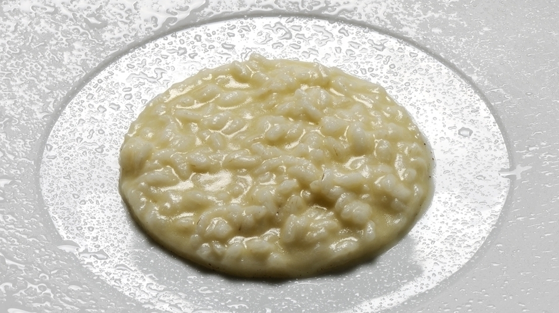 Chef Massimo Botturo's recipe for Italy's Parmigiano-Reggiano night, Cacio e Pepe — risotto with cheese and pepper.