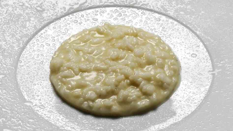 Chef Massimo Botturo's recipe for Italy's Parmigiano-Reggiano night, Cacio e Pepe — risotto with cheese and pepper.