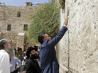 Republican presidential candidate Mitt Romney places a prayer note during a visit to the Western Wall in Jerusalem in July. Israel is one of the few foreign countries where residents have a clear preference for Romney over President Obama. Republican presidential candidate Mitt Romney places a prayer note during a visit to the Western Wall in Jerusalem in July. Israel is one of the few foreign countries where residents have a clear preference for Romney over President Obama.