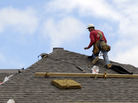 A construction worker finishes a roof in Chicago on Oct. 12. Signs of recovery in the housing market are springing up nationwide, but there's still a ways to go. A construction worker finishes a roof in Chicago on Oct. 12. Signs of recovery in the housing market are springing up nationwide, but there's still a ways to go.
