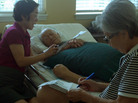 Frank Tanabe votes via absentee ballot with the help of his daughter, Barbara (left) and wife, Setsuko, in Honolulu on Oct. 17. He died the following week. Frank Tanabe votes via absentee ballot with the help of his daughter, Barbara (left) and wife, Setsuko, in Honolulu on Oct. 17. He died the following week.